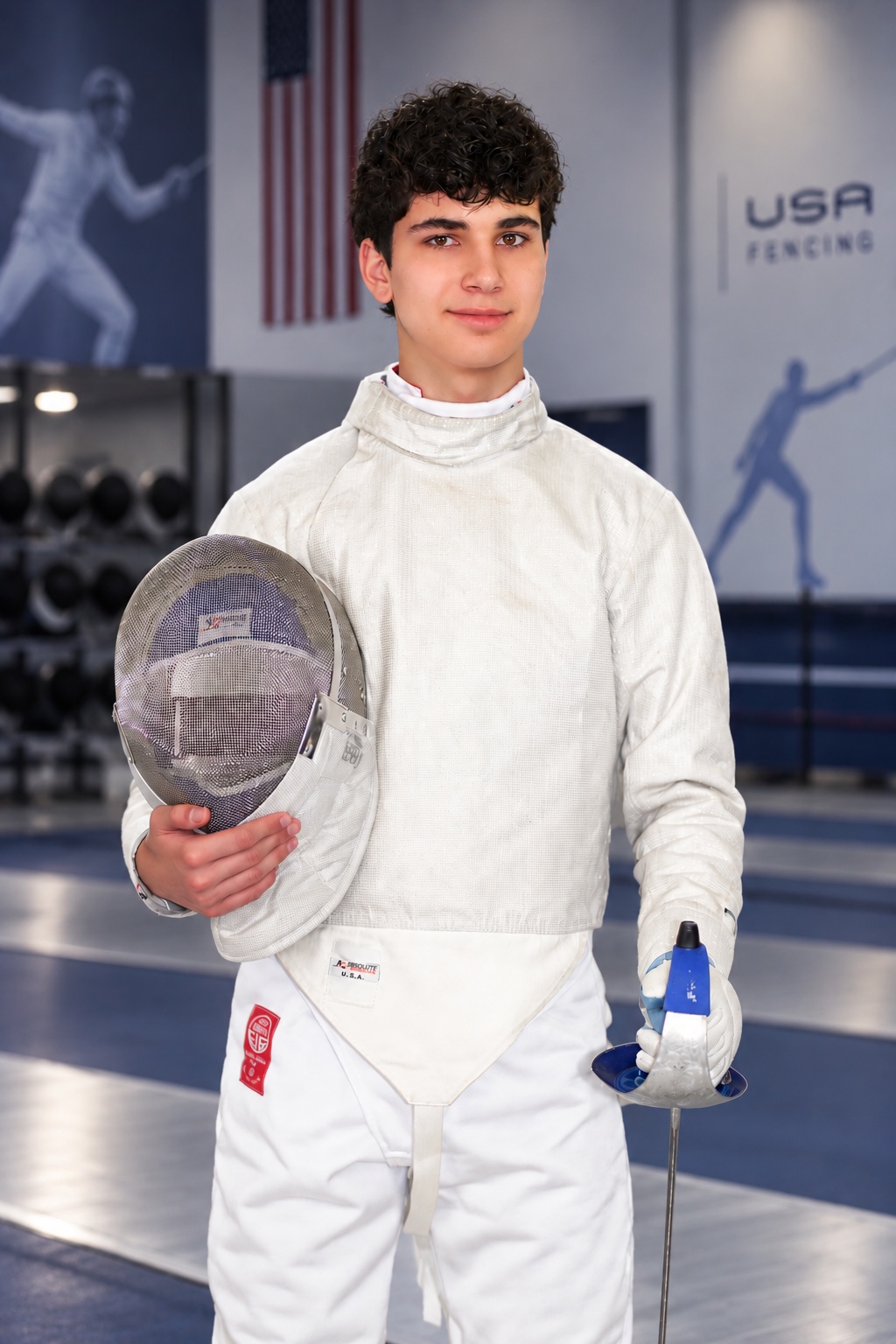 Benjamin Gurewich holding his fencing mask