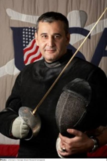 Portrait of Archil Achiko Lortkipanidze with a sabre and fencing mask