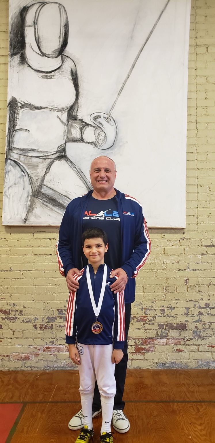 Alexander Lepeshinsky with Benjamin Gurewich after a youth fencing competition