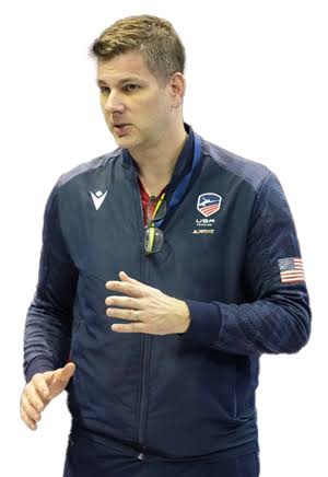 Tim Morehouse in a USA Fencing team jacket