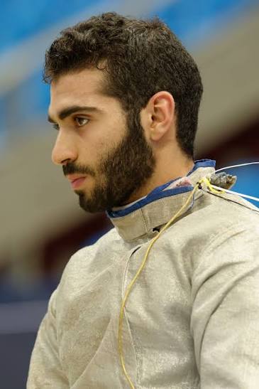 Portrait of Ziad Elsissy in fencing uniform